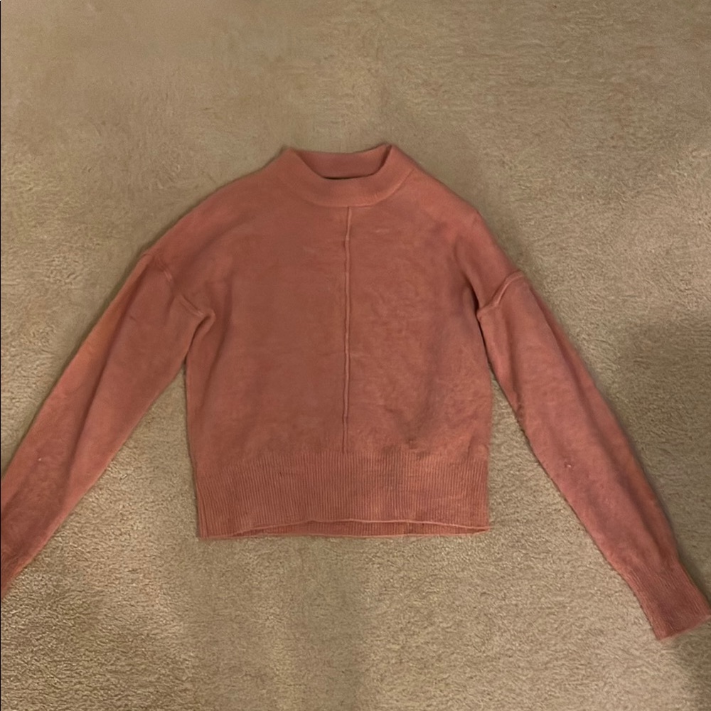 Women pink sweater